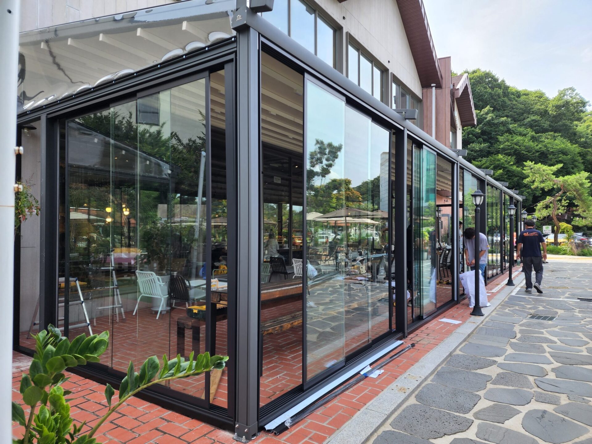 Restaurant with glass doors and windows, showcasing Nova Sun Horizon Plus