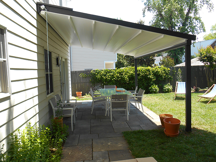 Sunair Pergola retractable fabric roof system on a residential home
