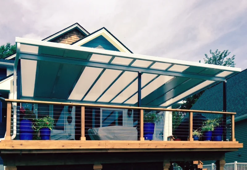 Modern Hybrid Patio Cover with solid and acrylic panels over a stylish elevated deck.