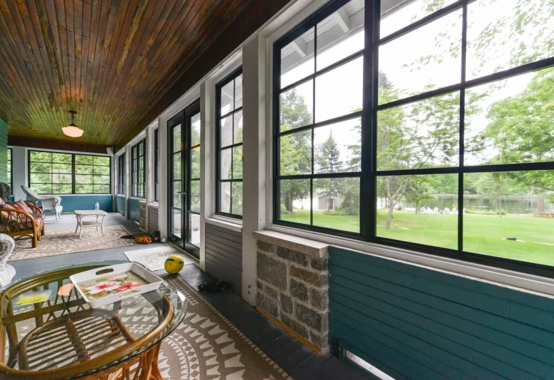 Porch with wicker chairs and WeatherMaster™ Windows & Doors