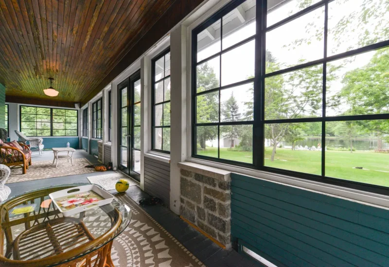 Porch with wicker chairs and WeatherMaster™ Windows & Doors