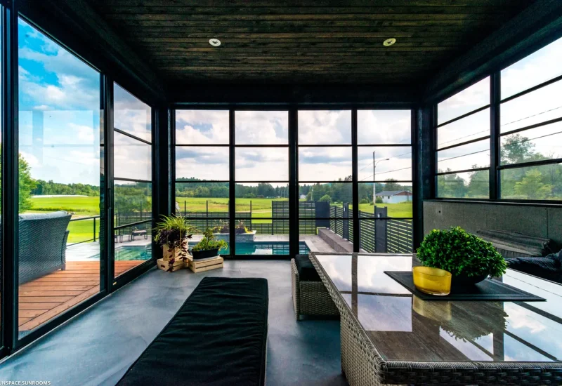 Glass table and chairs near large window